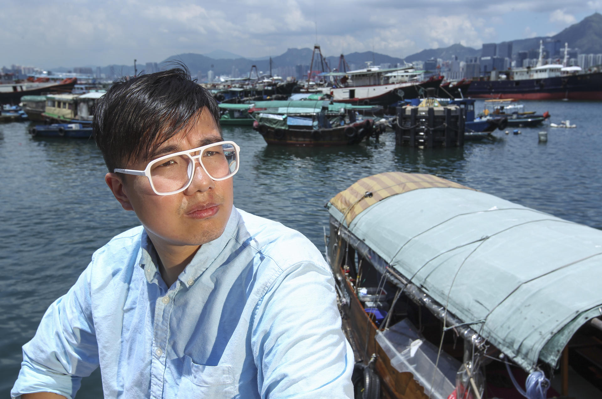 Isaac Wong spent his early years on a houseboat in Shau Kei Wan. He shares his thoughts on local culture and traditions in a fortnightly self-funded magazine. Photo: Nora Tam