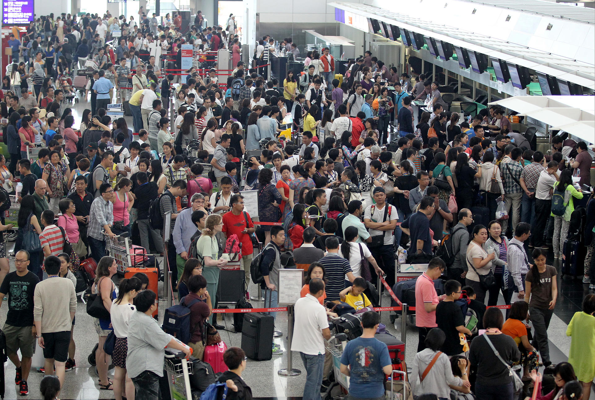 Passengers at the airport in Hong Kong, where Cathay Pacific relies heavily on premium travellers for revenue. Photo: K.Y. Cheng