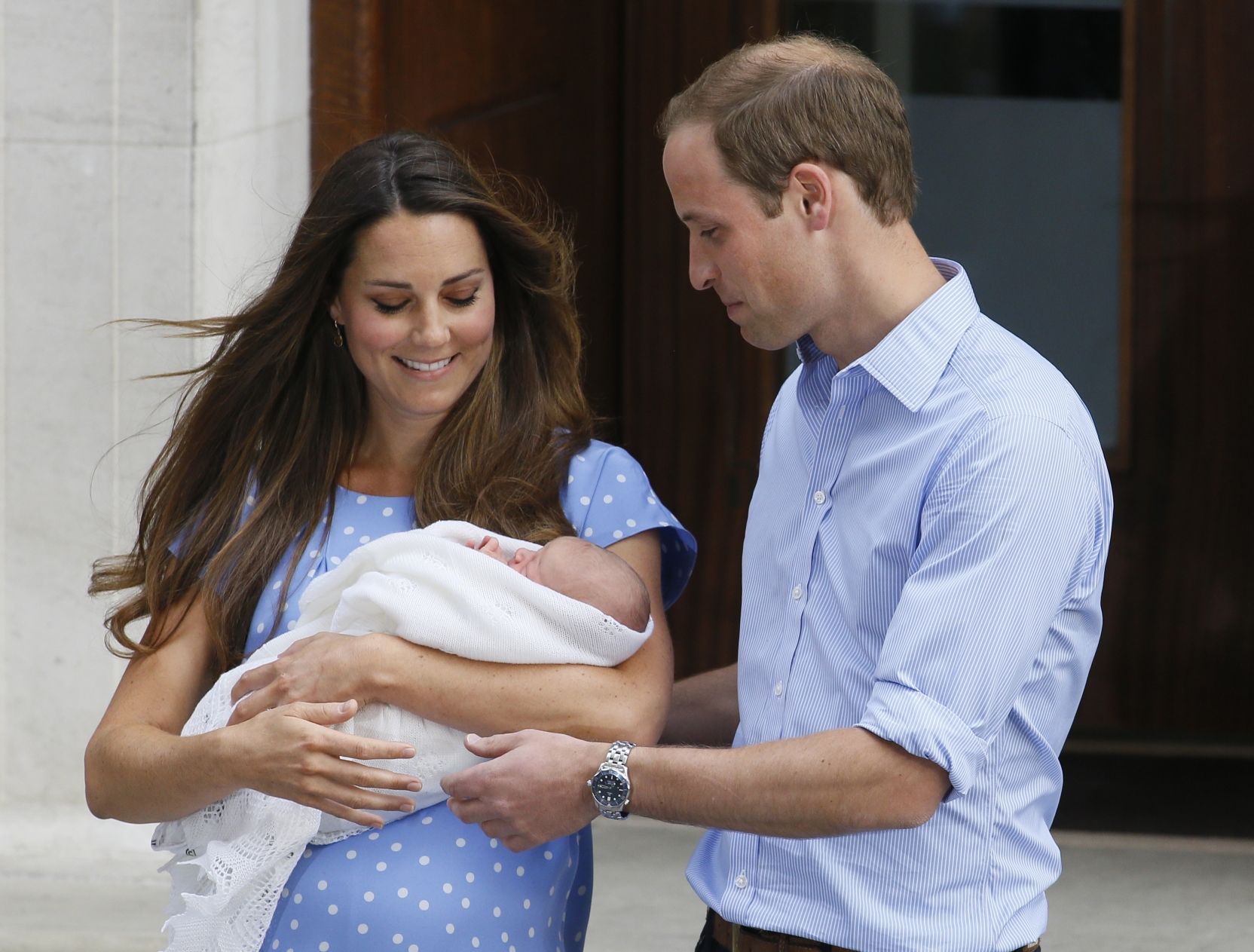 Britain's Prince William and Kate, Duchess of Cambridge and the Prince of Cambridge. Photo: AP