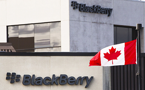 A Canadian flag waves at the Blackberry campus in Waterloo, Ontario. Photo: Reuters