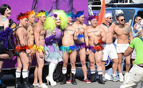 Attendees pose during the annual gay parade in Taipei on Saturday. Photo: AFP