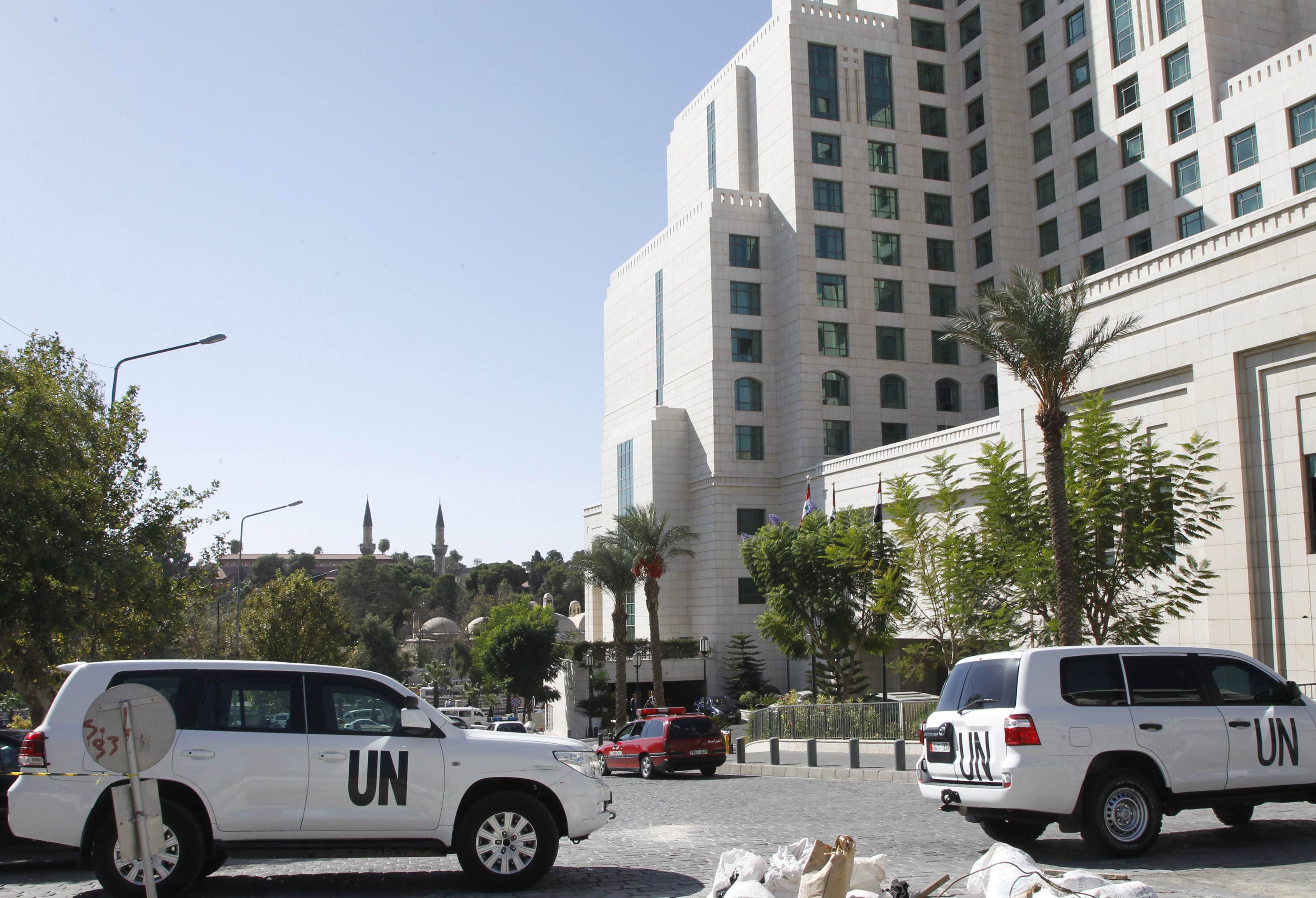UN vehicles carrying OPCW inspectors in Damascus. Photo: Reuters