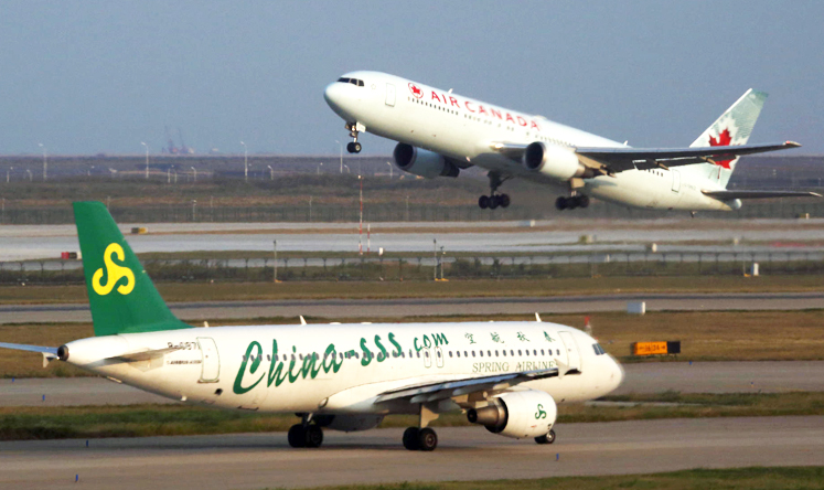 Spring Airlines, the mainland's only budget airline, faces competition as Beijing develops the low-cost carrier market. Photo: Bloomberg