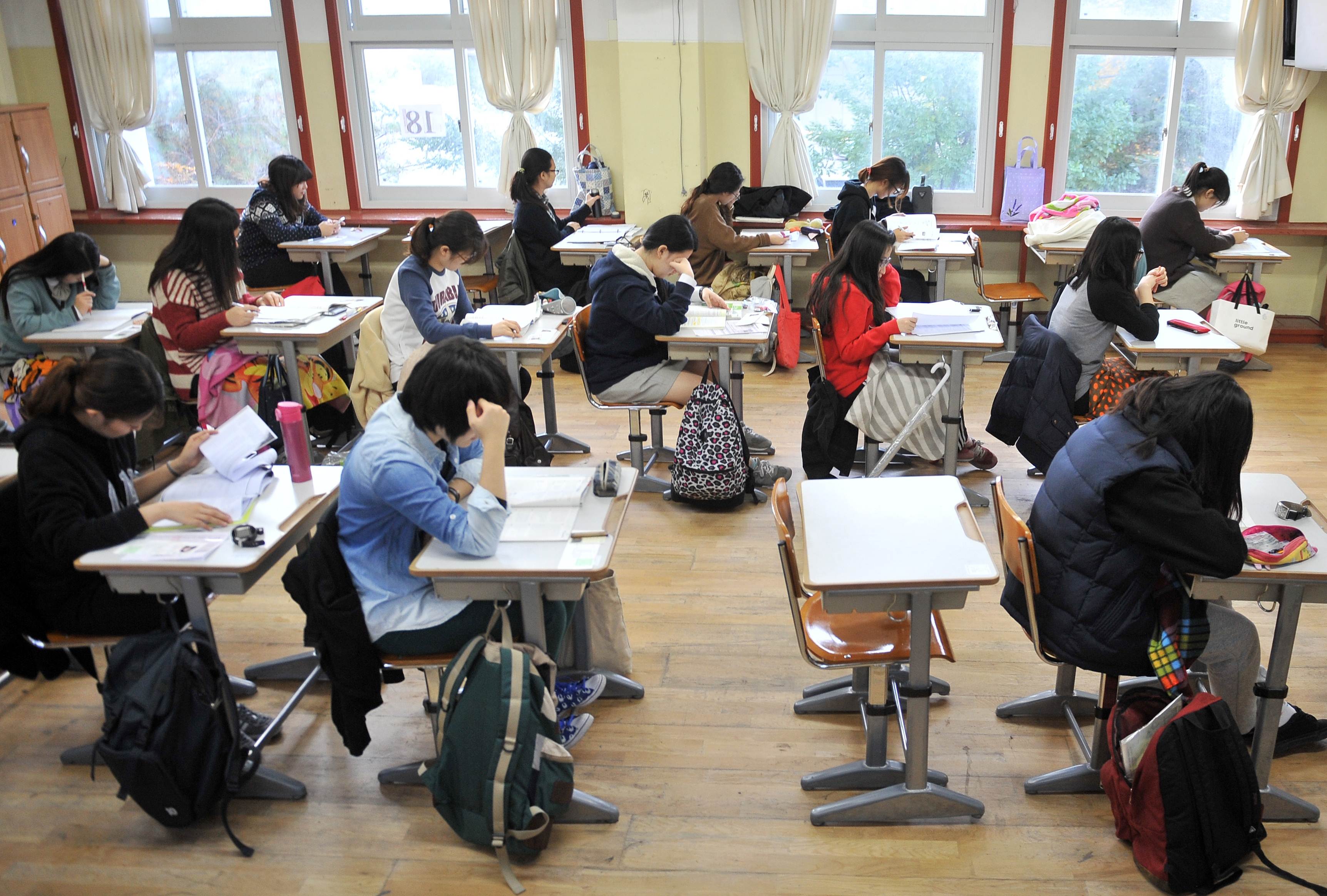 South Korean students prepare to take the standardised exam for college entrance at a high school in Seoul. Photo: AFP