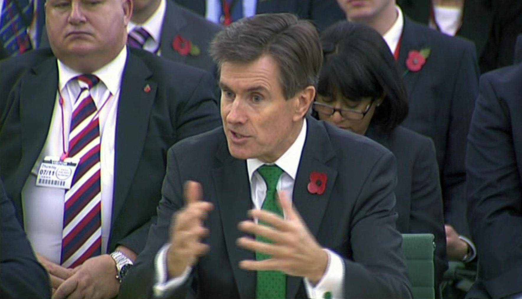 John Sawers, head of Britain's foreign spy service MI6, during the precedented joint public appearance for the three spy chiefs. Photo: AP