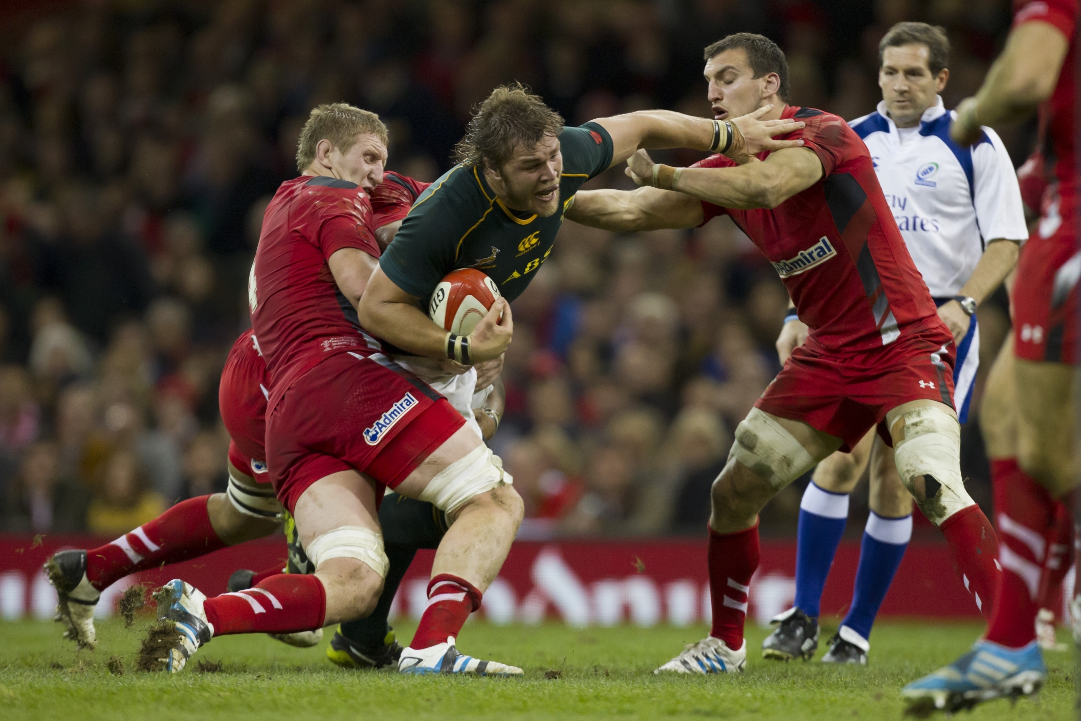 South Africa's Duane Vermeulen is tackled by Wales' Sam Warburton and Bradley Davies during at the Millennium Stadium, Cardiff, on Saturday. Photo: AP