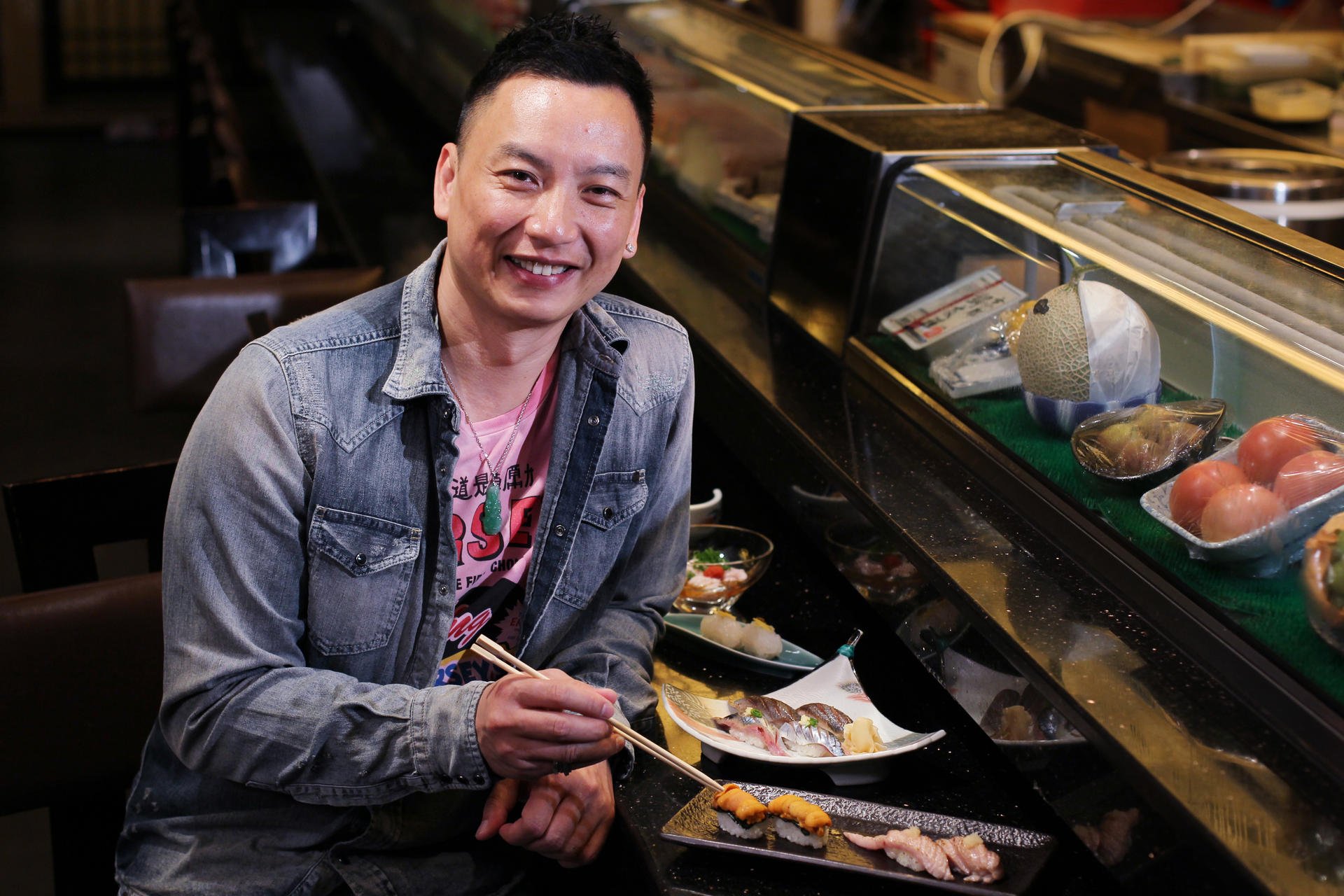 Jacky Yu prepares to tuck into the food at Tomokazu Japanese Restaurant in Wan Chai. Photos: Nora Tam
