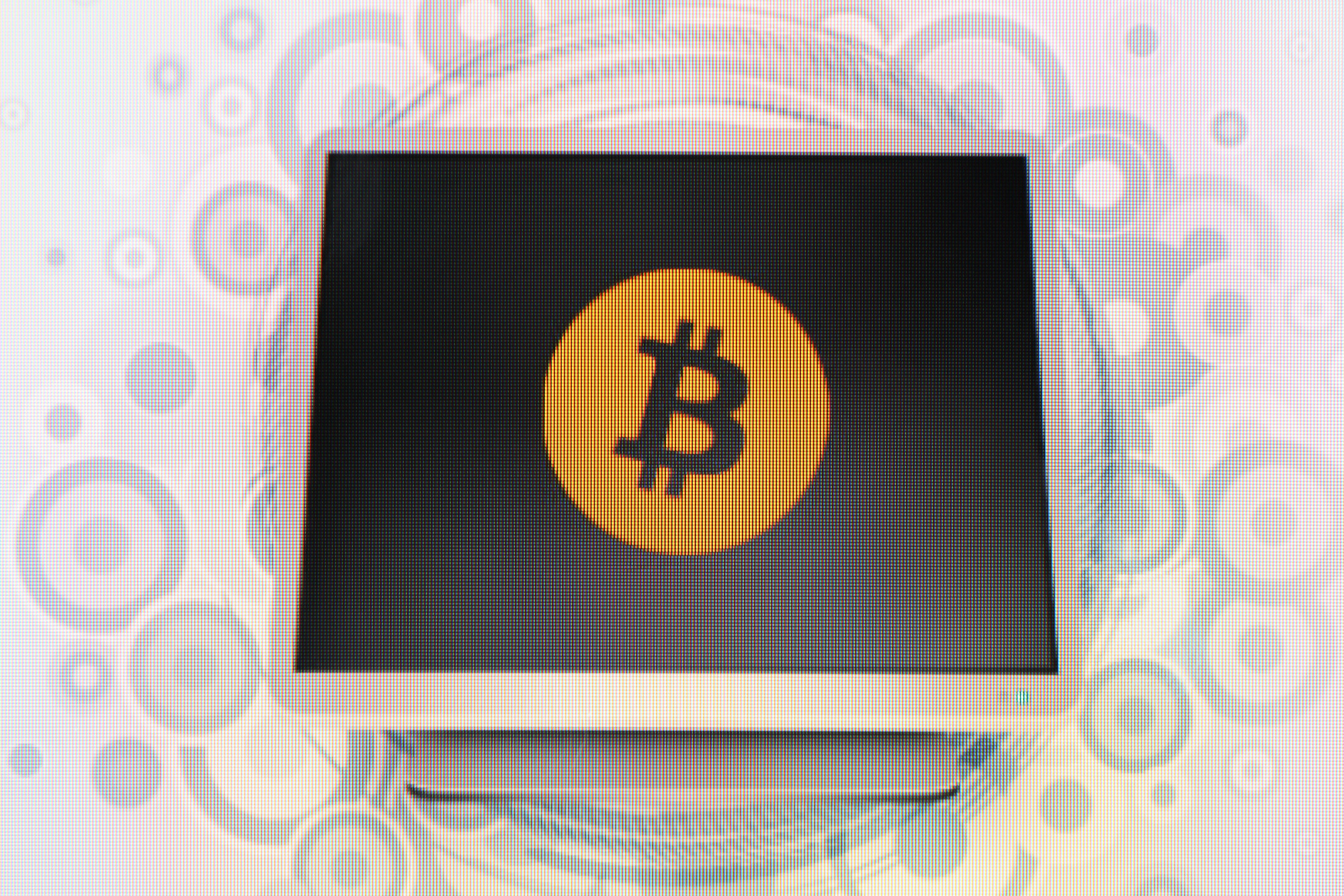 The bitcoin currency logo on an internet website. Photo: AFP