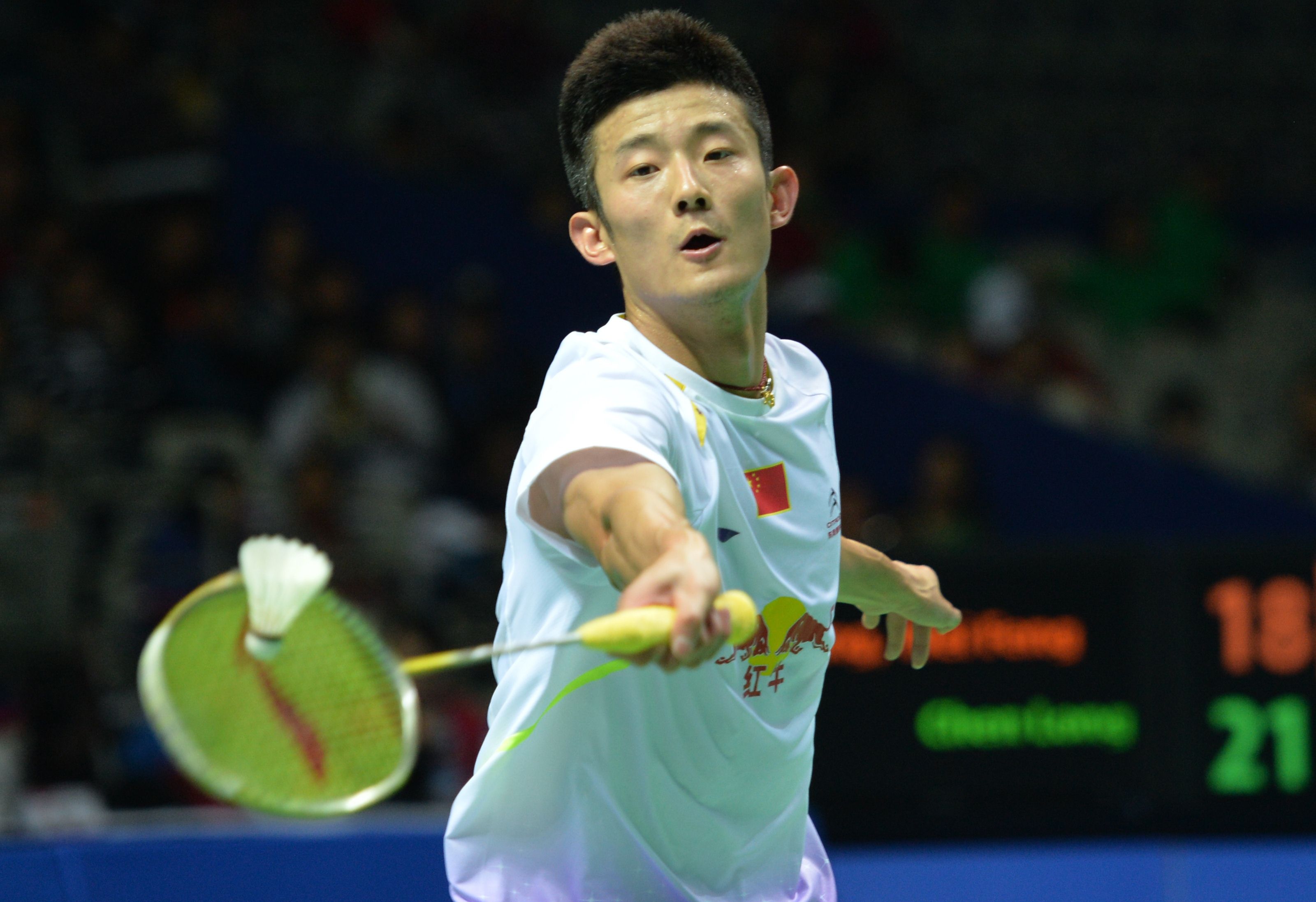 Chen Long of China hits a return to Wei Feng Chong of Malaysia in the men's singles semi-final at the China Open. Photo: AFP