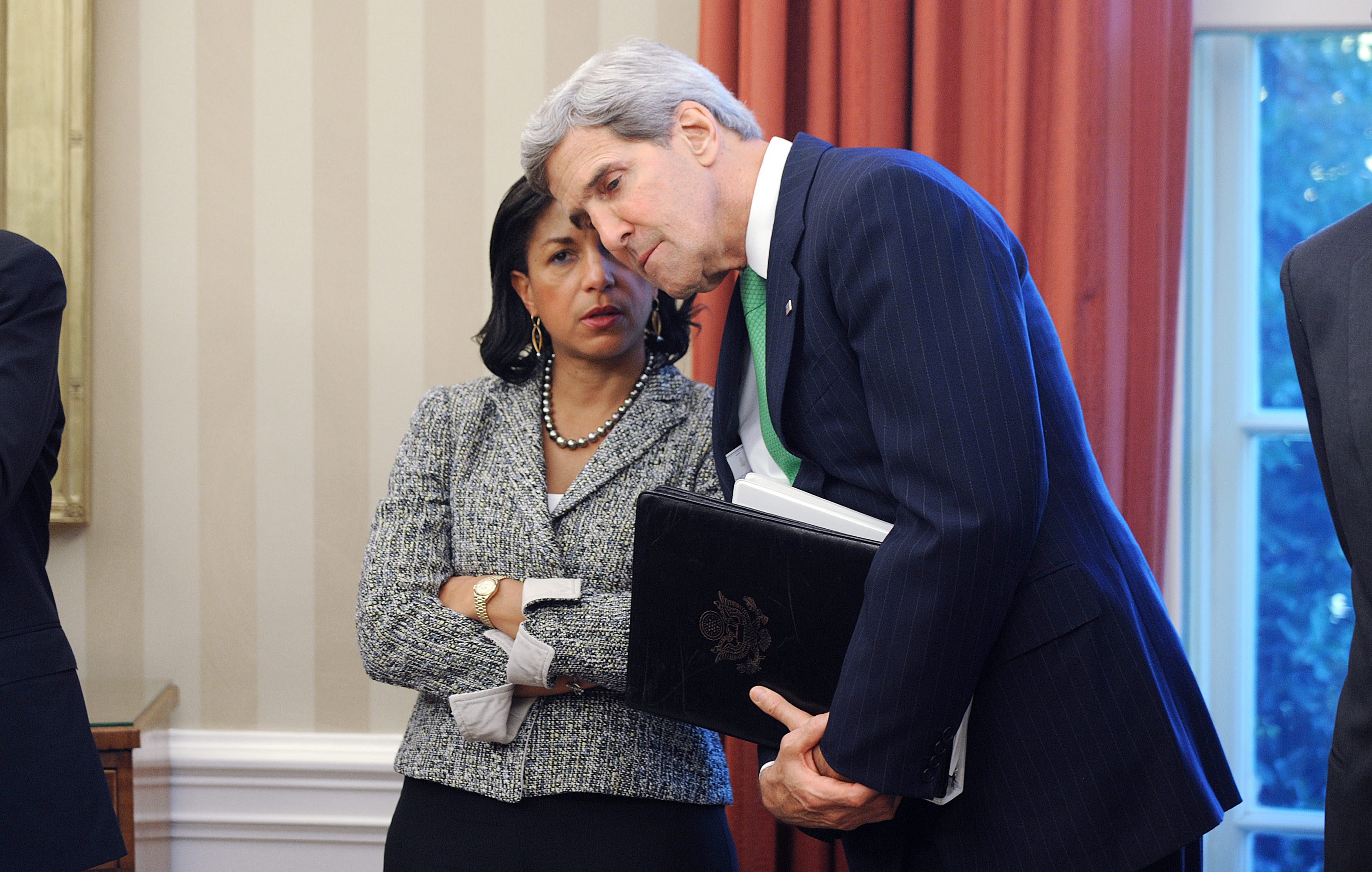 US National Security Adviser Susan Rice (left) confers with Secretary of State John Kerry at the White House. Photo: EPA
