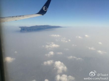Explosion reportedly seen from a passing airplane. Screenshot via Sina Weibo
