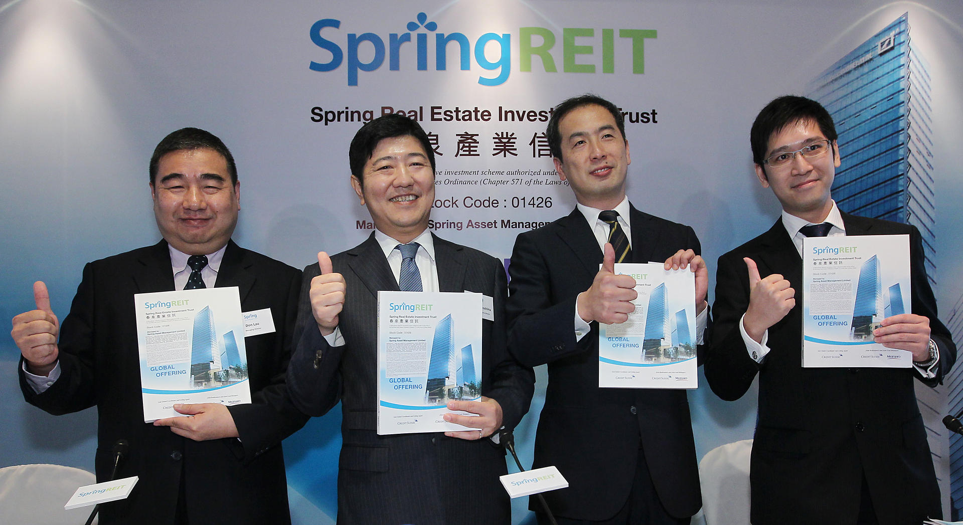(Left to right) Spring REIT managing director Don Lau Jin-tin, chairman and non-executive director Toshihiro Toyoshima, managing director Nobumasa Saeki and senior vice-president Michael Chung Wai-fai announce the global offering in Admiralty. Photo: Edmond So