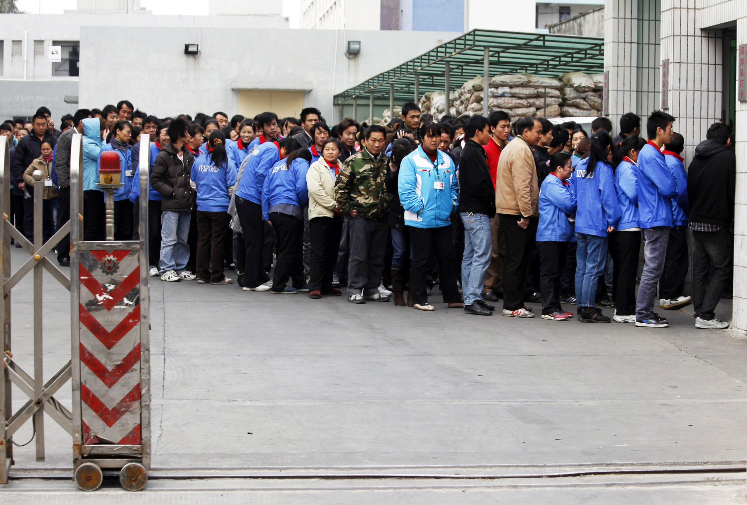 Guangdong’s 30 million or so migrant workers are often denied the same benefits as locals. Photo: Reuters