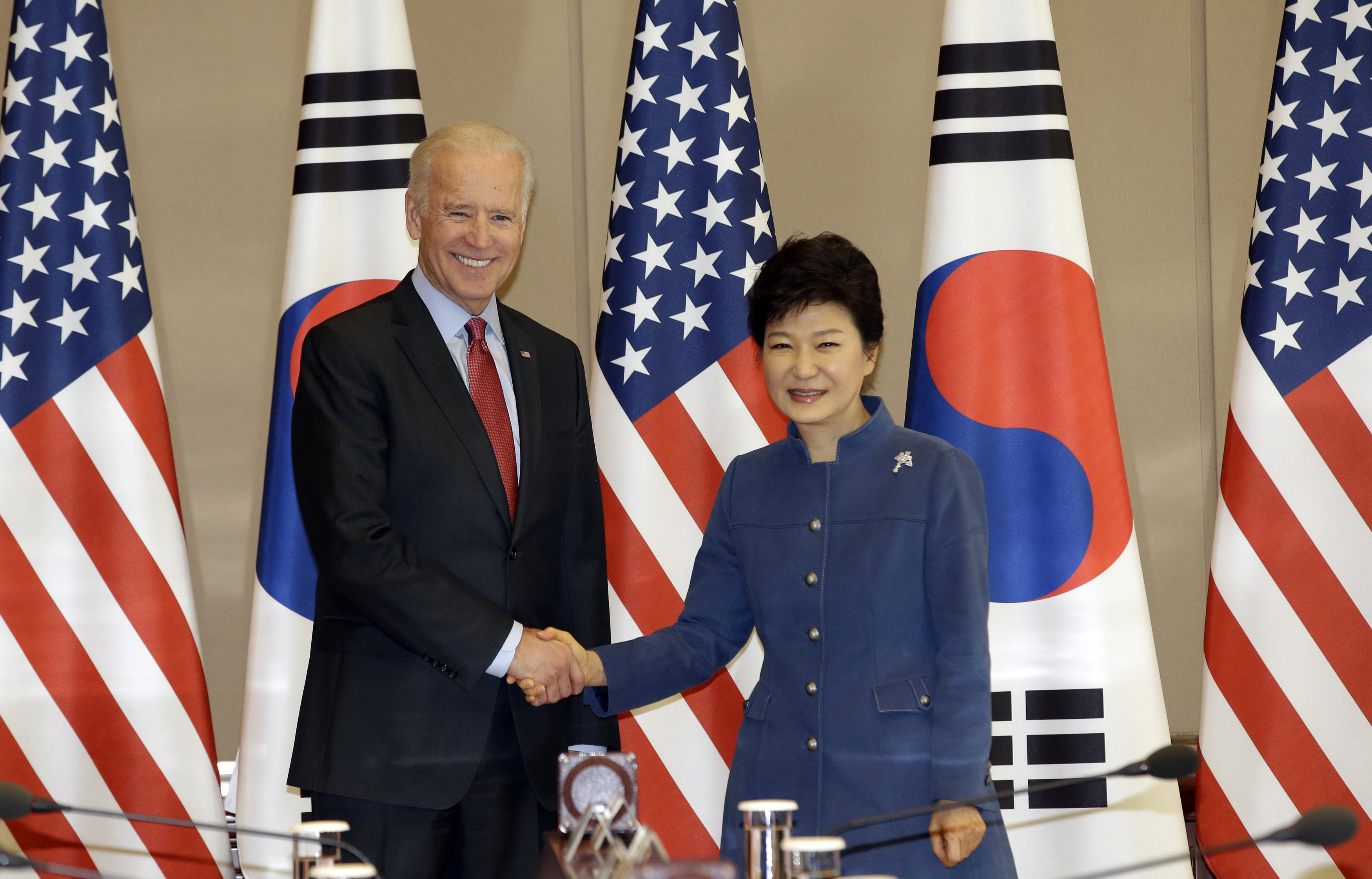 US Vice-President Joe Biden shakes hands with South Korean President Park Geun-hye in Seoul on Friday. Photo: AP