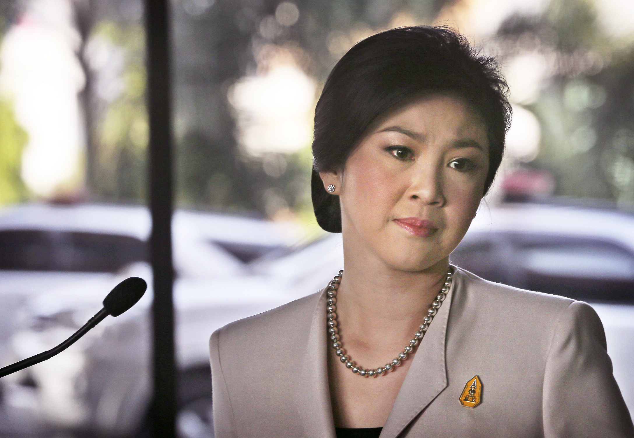 Thailand's Prime Minister Yingluck Shinawatra gets emotional after speaking at a press conference, in Bangkok. Photo: AP