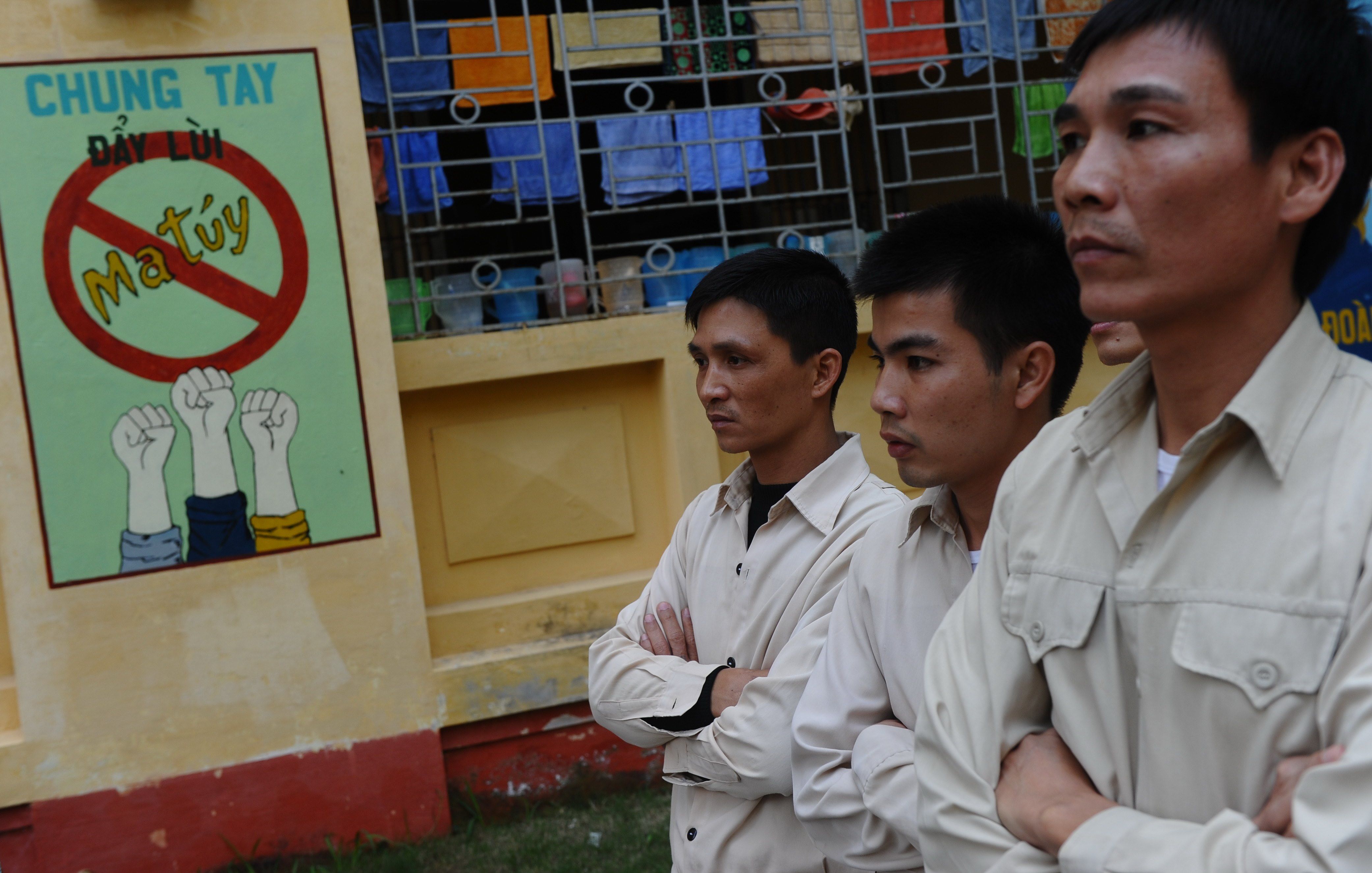 Drug addict inmates watch a music concert named "Bringing music into hospitals" on the World Aids Day at an official center for treatment of drug addicts in Hanoi in 2013. Photo: AFP 