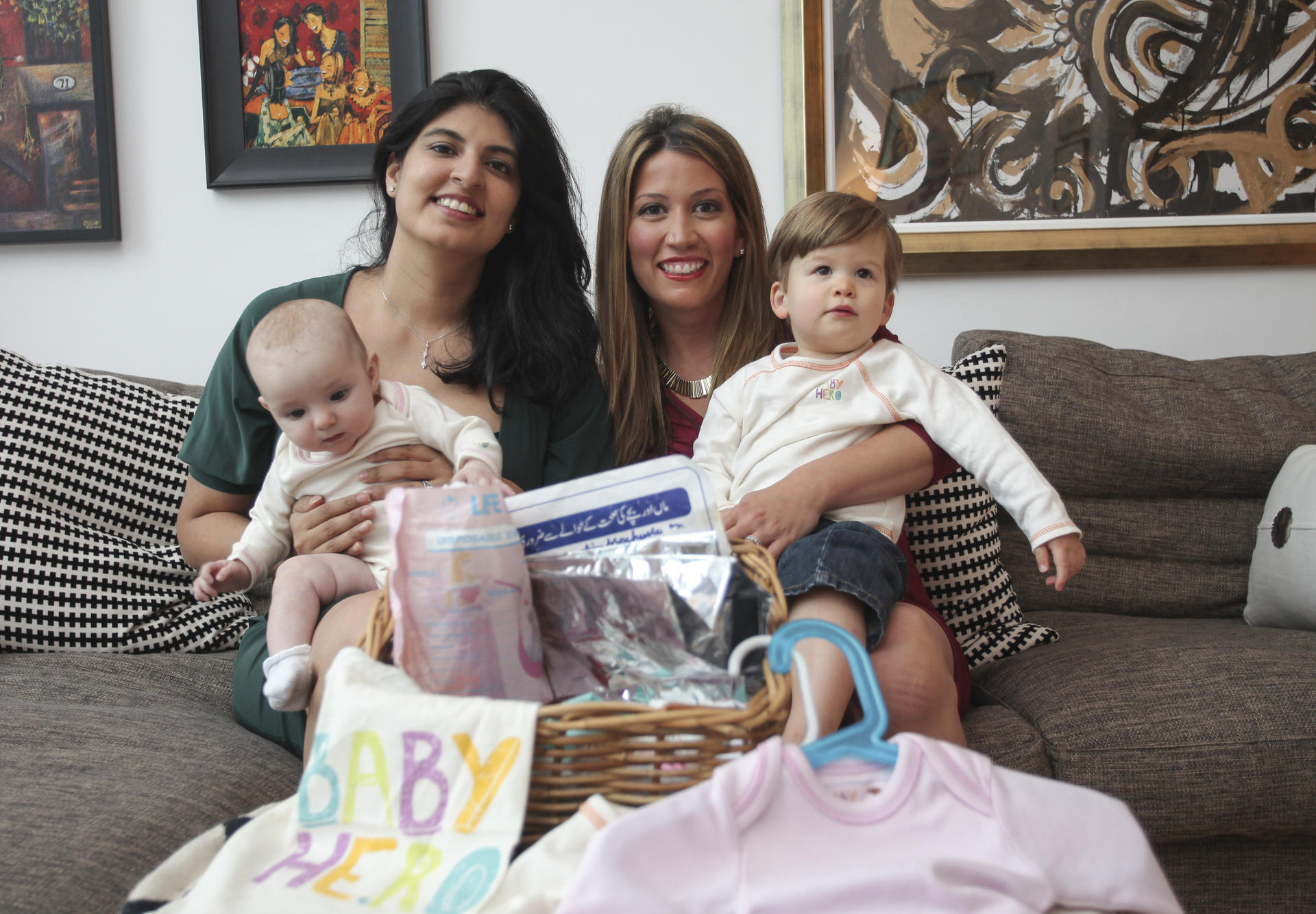 Samar Shaheryar (left), with baby Isha, and Alicia Wieser, with son Cooper Elliott. Photo: Paul Yeung
