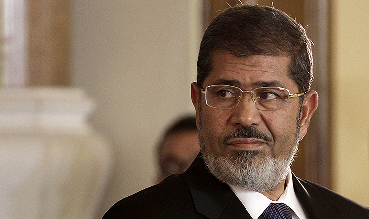Former Egyptian President Mohammed Mursi is already standing trial for inciting violence during protests outside the presidential palace a year ago. Photo: Reuters