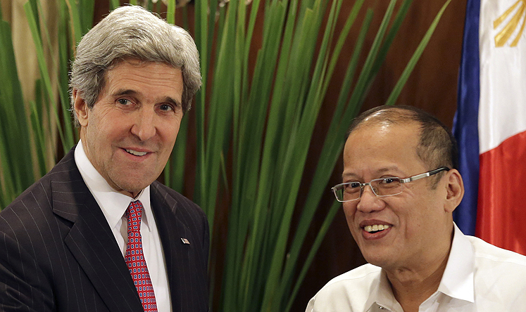 US Secretary of State John Kerry with Philippine President Benigno Aquino in Manila on Tuesday. Photo: AP 