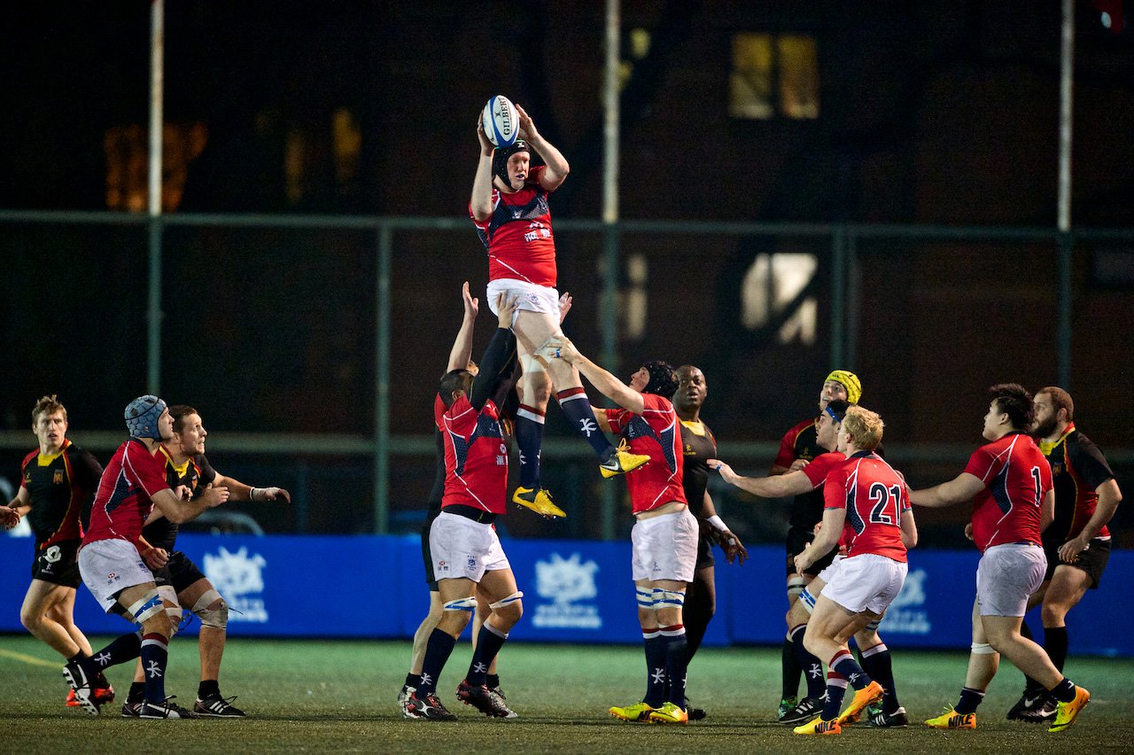 Lock Paul Dwyer, one of six Hong Kong players to earn his first international cap in the opening Belgium test, completes a clean lineout take. Photo: HKRFU