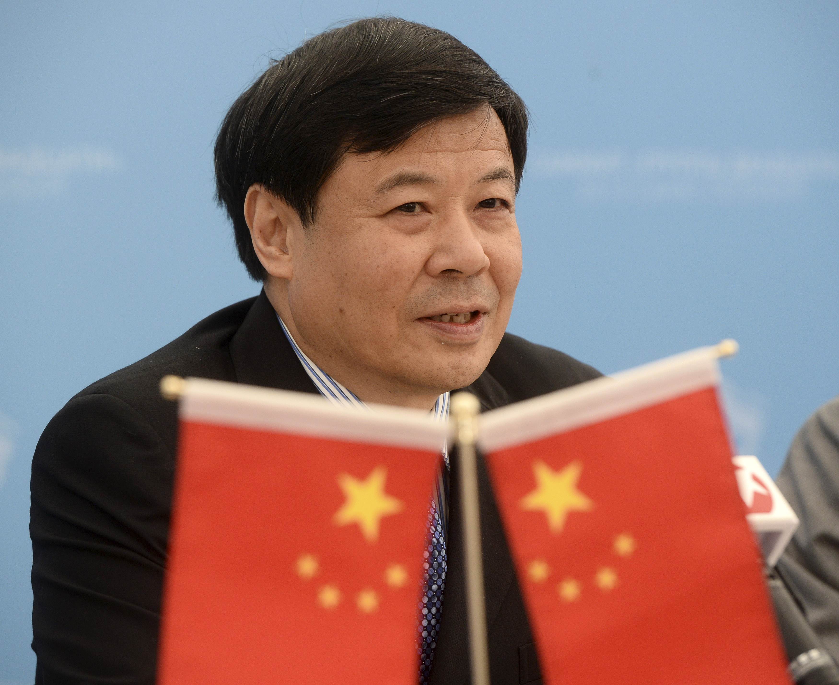Chinese minister Zhu Guangyao said Fed's tapering was a sign of US economy stabilising but cautioned the "ultra-low" interest rate's impact on macro economy. Photo: Reuters