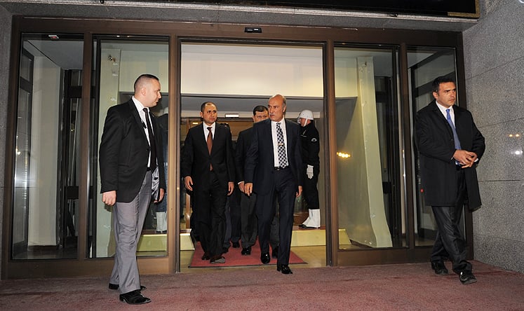Former Istanbul chief of police, Huseyin Capkin (centre right), was removed from office after overseeing a wave of high-profile bribery arrests this week. Photo: EPA