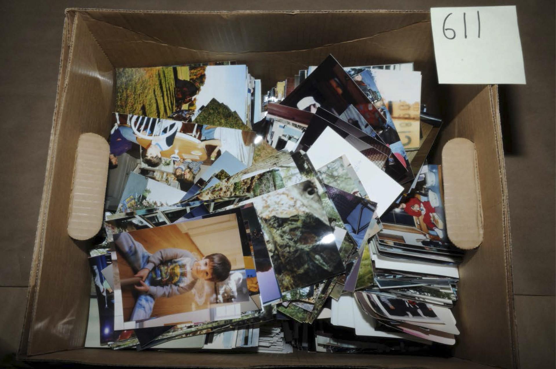 A box of photos taken from the Lanzas' home. Photo: Reuters
