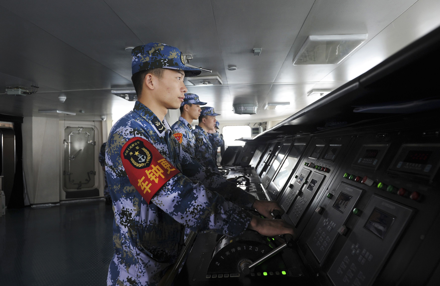 Chinese naval soldiers on China's first aircraft carrier Liaoning. Photo: Reuters