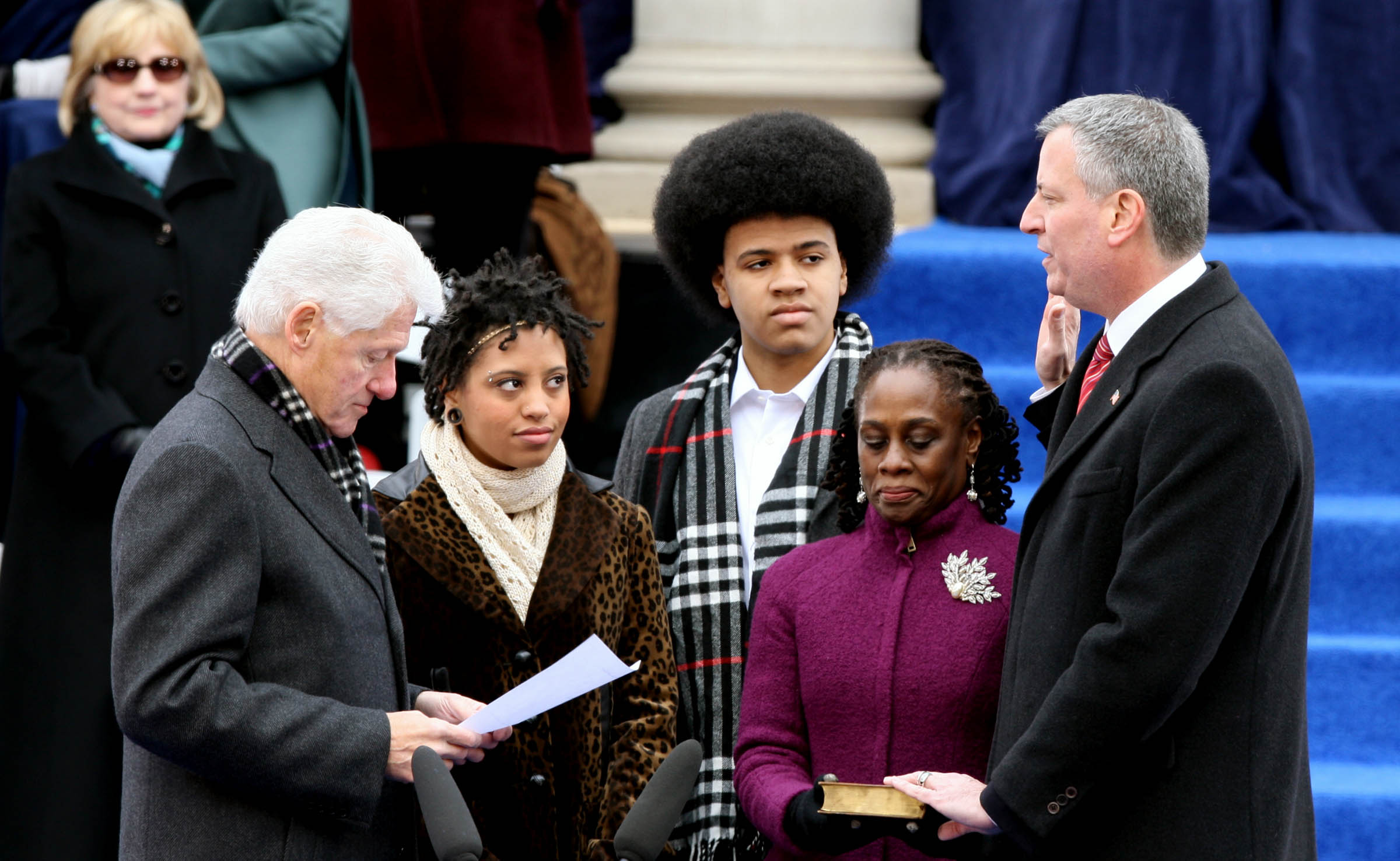 Bill de Blasio (right) is sworn in as New York's 109th mayor by former President Bill Clinton (left) at City Hall on Wednesday. Photo: Xinhua