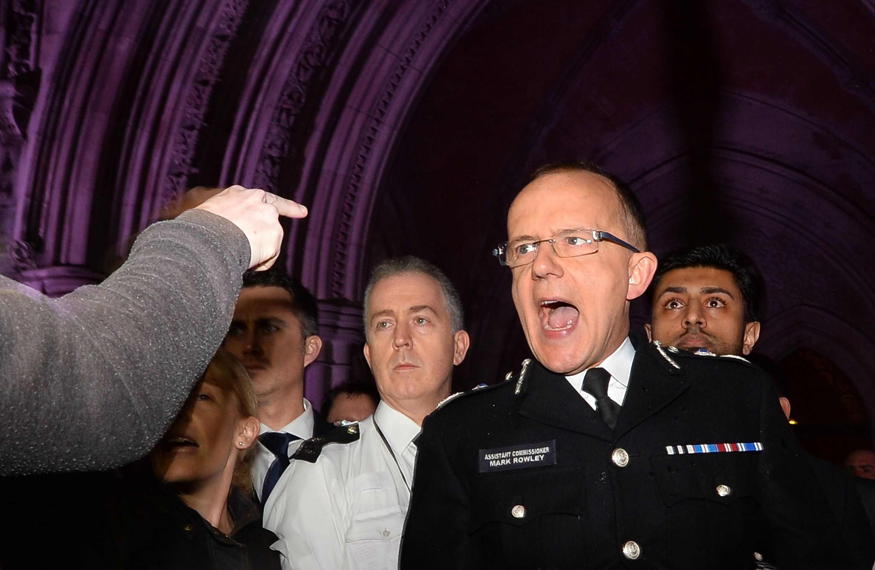 Assistant Commissioner Mark Rowley addresses the media and the public outside the Royal Courts of Justice in London. Photo: AFP