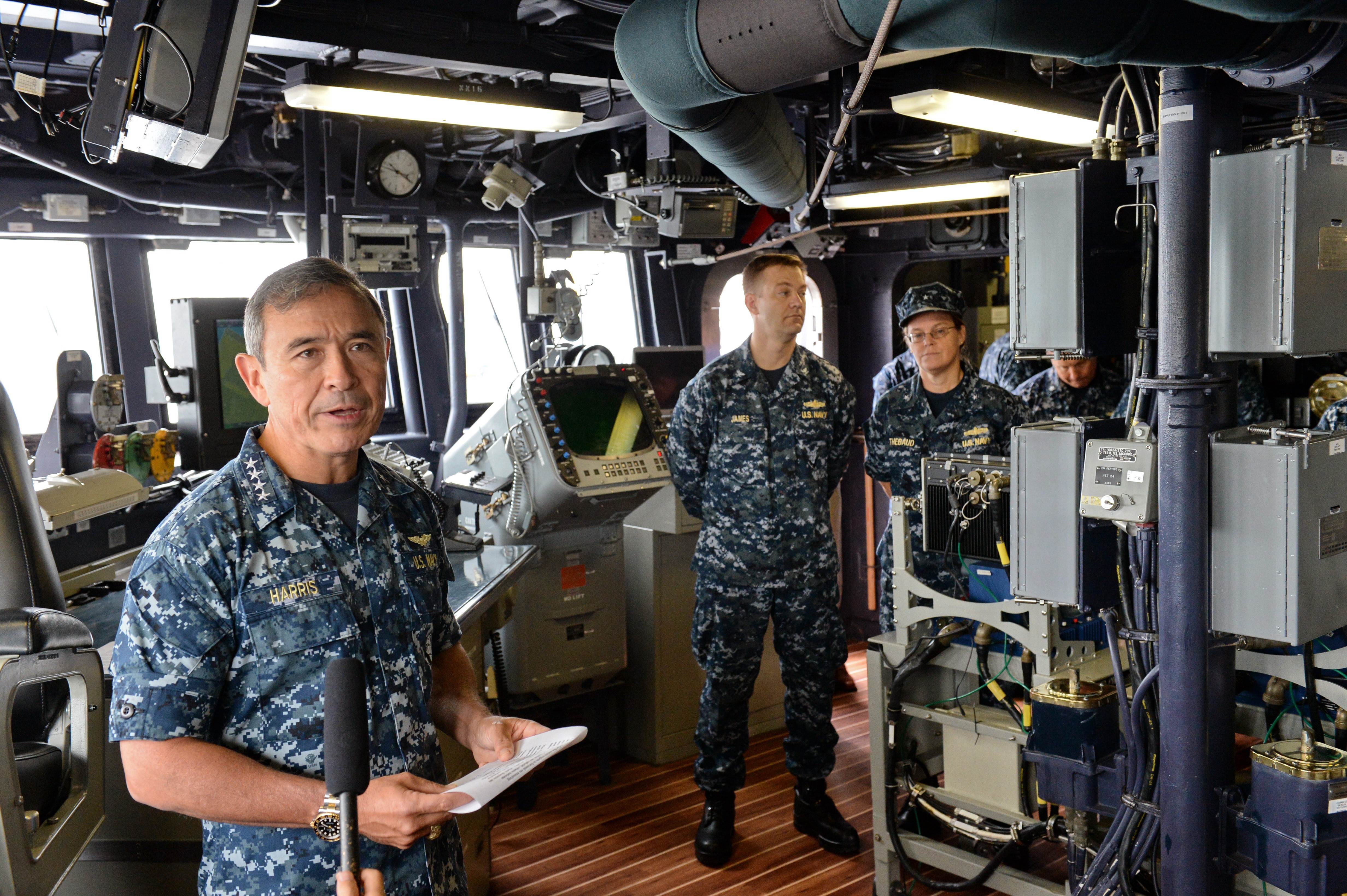 US Navy's Pacific Fleet commander Admiral Harry B Harris Jr (left) speaks to journalists onboard the USS Spruance in Singapore on Wednesday. Photo: AFP