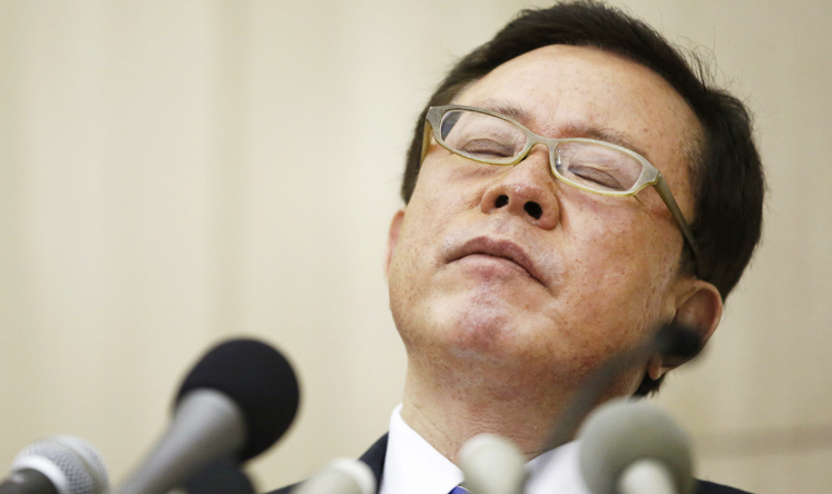Former Tokyo Governor Naoki Inose during a news conference to announce his resignation in December. Photo: Reuters