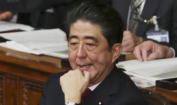 Japanese Prime Minister Shinzo Abe attends the opening session at the lower house of Parliament in Tokyo on Friday. Photo: AP