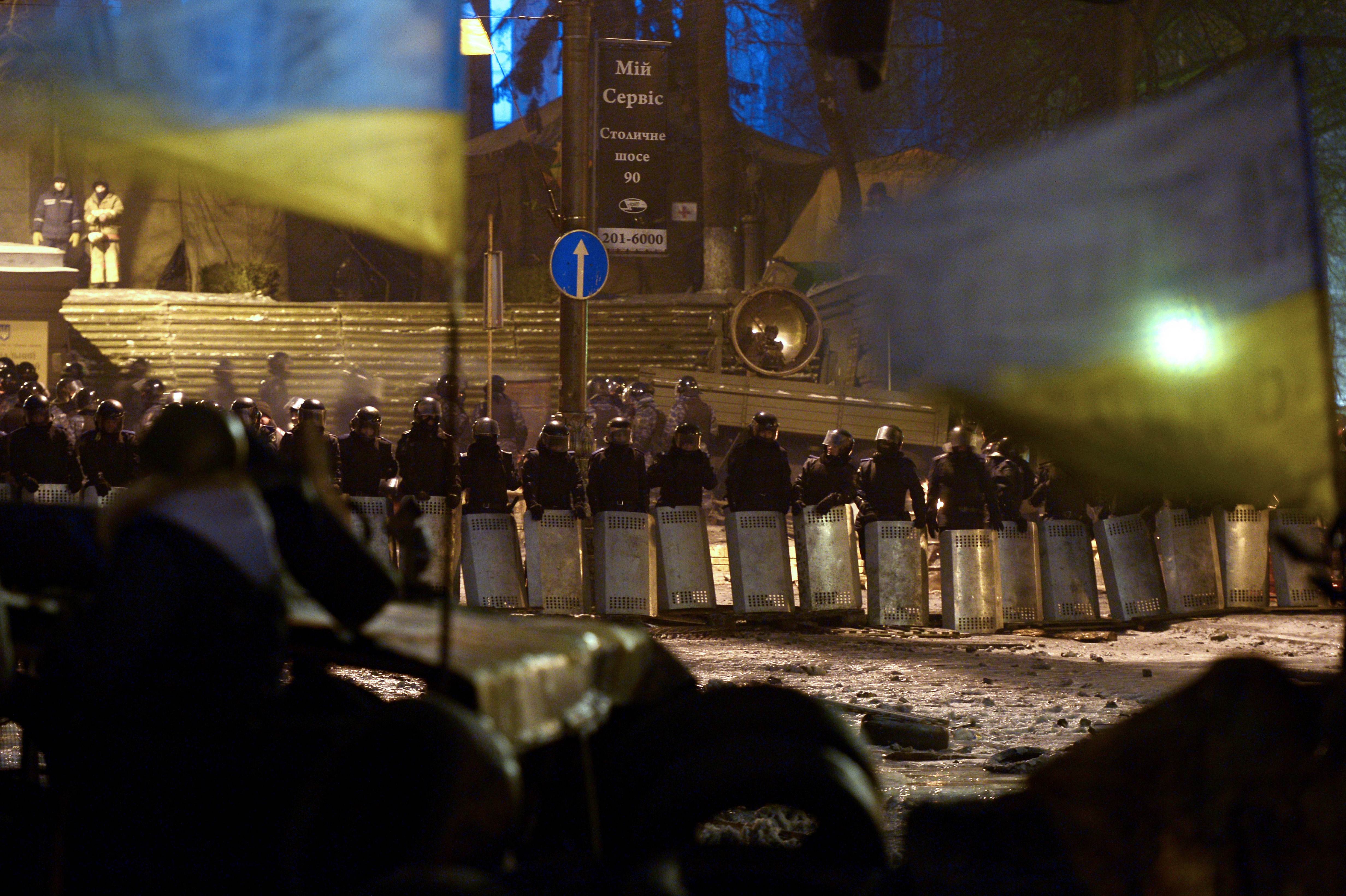 Riot police face off against anti-government protesters in Kiev on Tuesday. Photo: AFP 