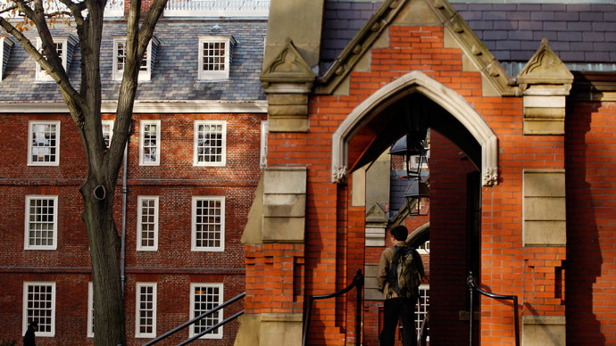 A student stands in the entrance-way of a building at Harvard University in Cambridge, Massachusetts. Photo: Reuters