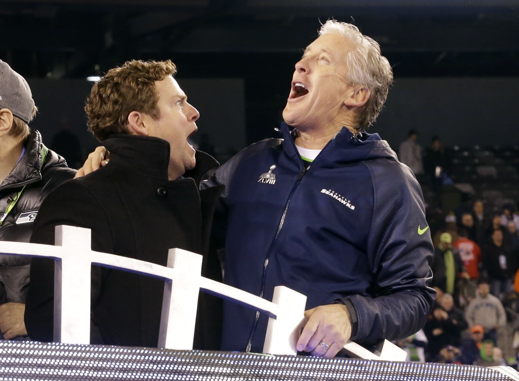 Seattle head coach Pete Carroll (right) celebrates with general manager John Schneider after winning Super Bowl XLVIII. Photo: AP