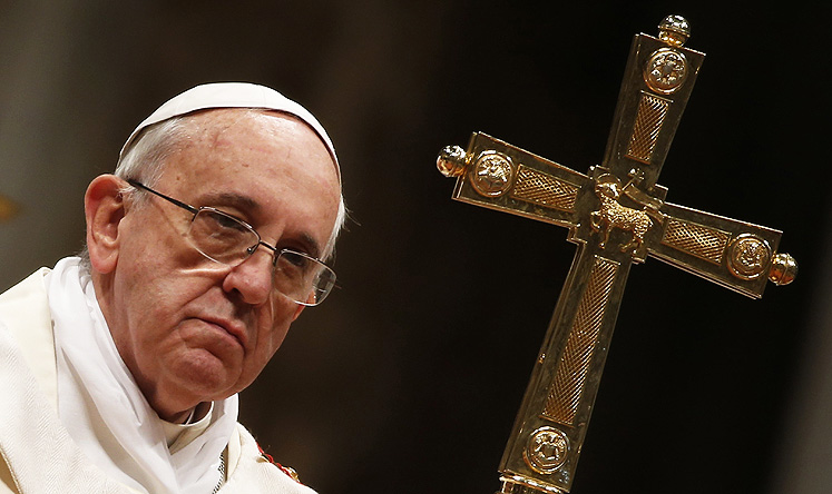 Pope Francis celebrates mass in Saint Peter's Basilica at the Vatican on Sunday. Photo: Reuters 