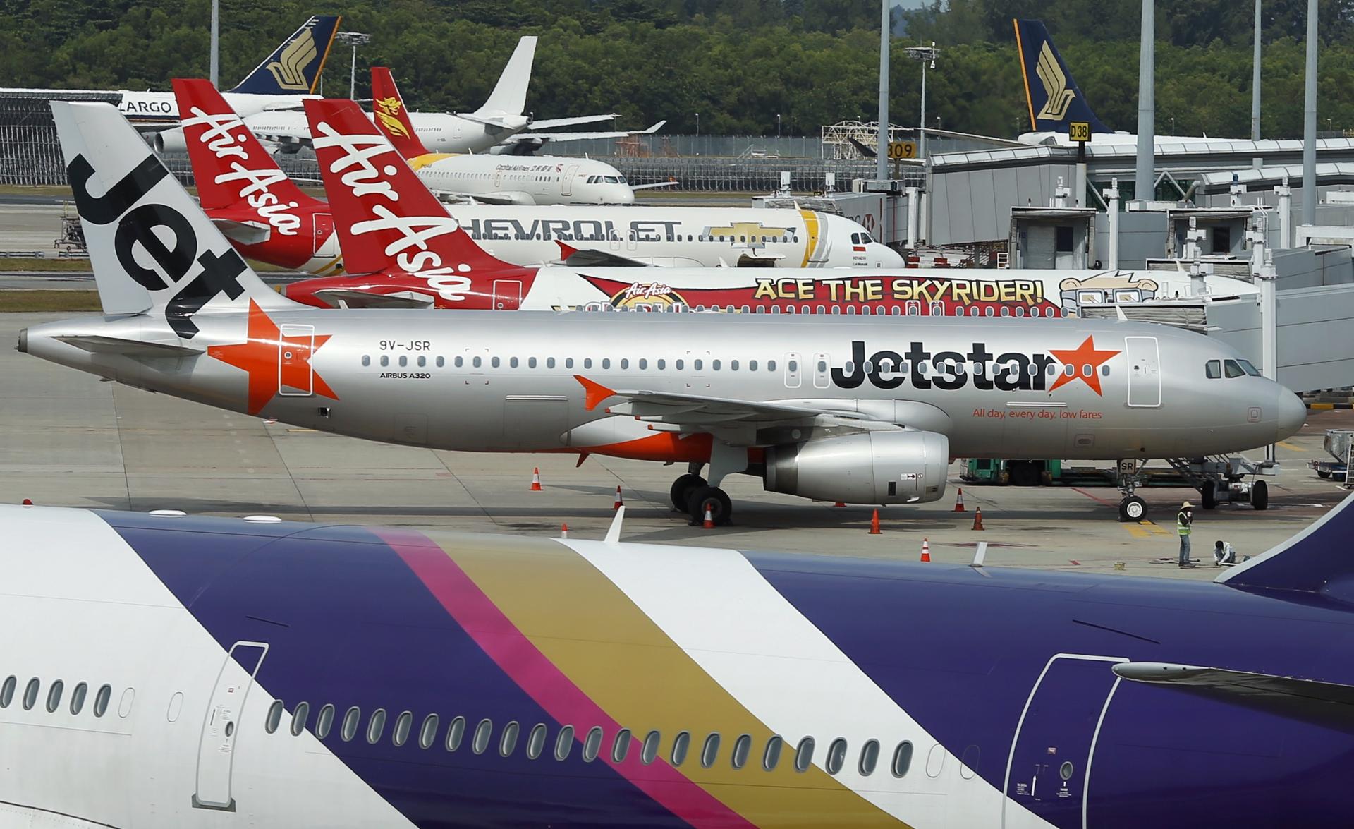 Budget carriers sit on the tarmac at Singapore's Changi Airport. New aircraft purchases are expected to be announced during the Singapore Airshow this week. Photo: Reuters