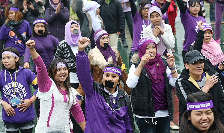 Domestic helpers gather in Victoria Park to march in support of Erwiana, the Indonesian maid who was abused by her Hong Kong employer. Photo: David Wong