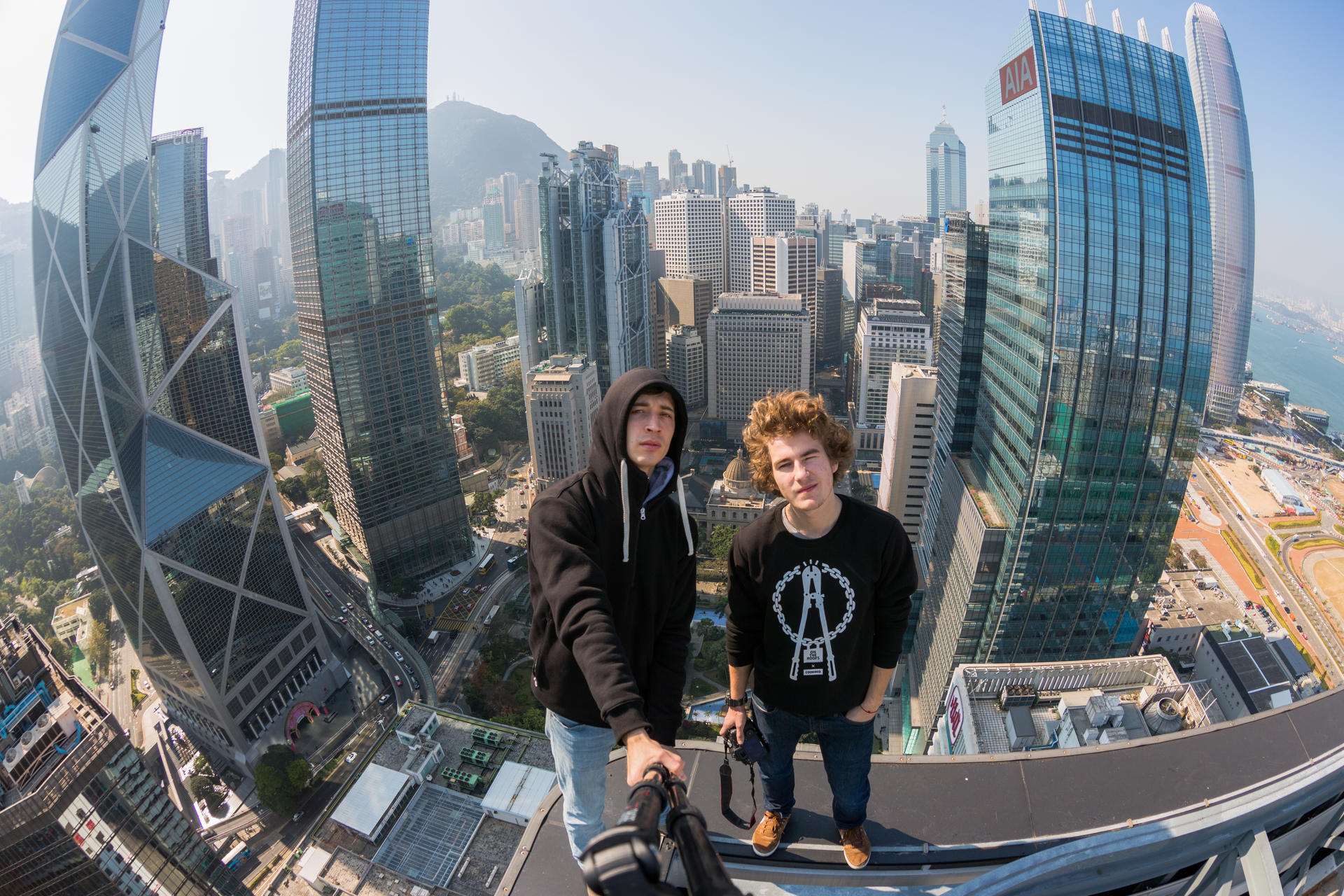 Vadim Makhorov (left) and Vitaliy Raskalov photograph themselves atop the 146-metre high Bank of America Tower earlier this year.