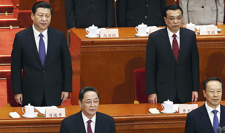 President Xi Jinping (top left), Premier Li Keqiang (top right) lead officials in the opening of the second session of the 12th National Committee of the Chinese People's Political Consultative Conference (CPPCC) in Beijing. Photo: EPA