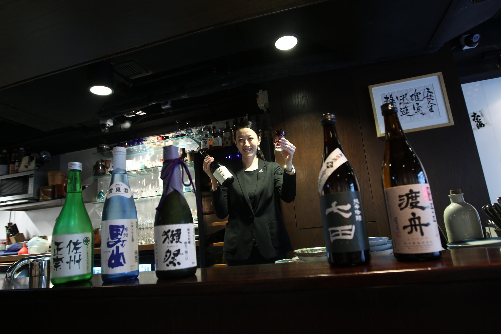 Sake sommelier Ayuchi Momose features rice wines from small Japanese breweries at Sake Bar Ginn in Lan Kwai Fong.