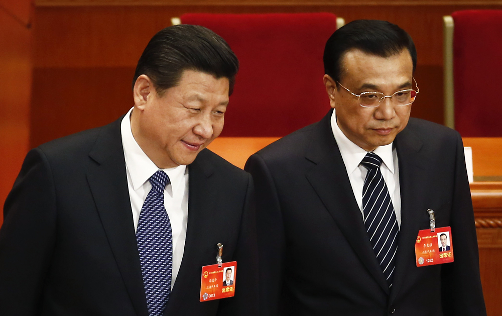 Li Keqiang (right) with Communist Party chief Xi Jinping at the closing of the National People's Congress session yesterday. Photo: AP