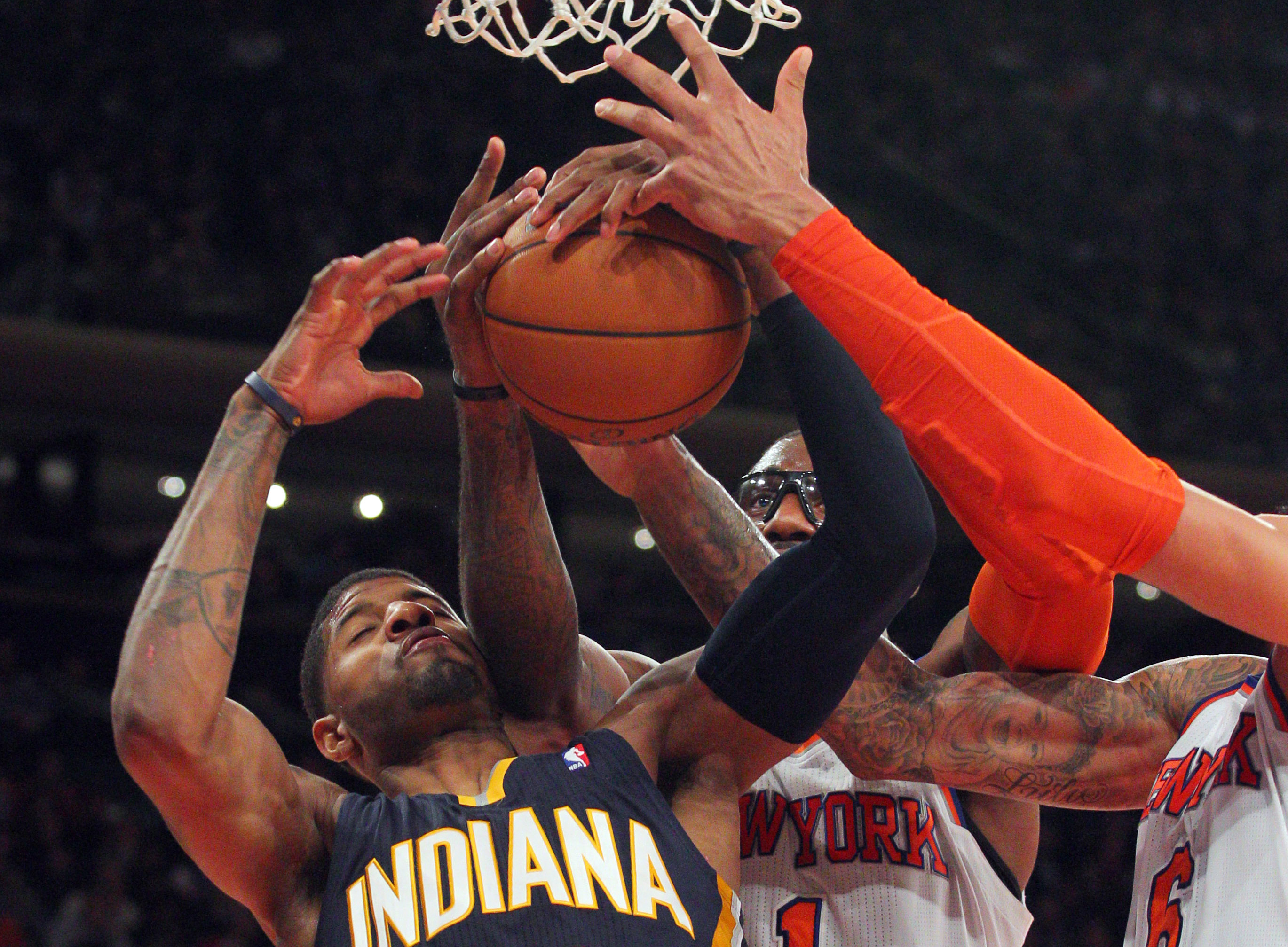 Indiana Pacers small forward Paul George and New York Knicks power forward Amare Stoudemire fight for a rebound in their NBA game at Madison Square Garden. The Knicks defeated the Pacers 92-86. Photo: USA TODAY Sports