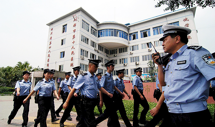 Chengdu civil servants must report to their bosses if they leave the city for work or holidays. Photo: EPA