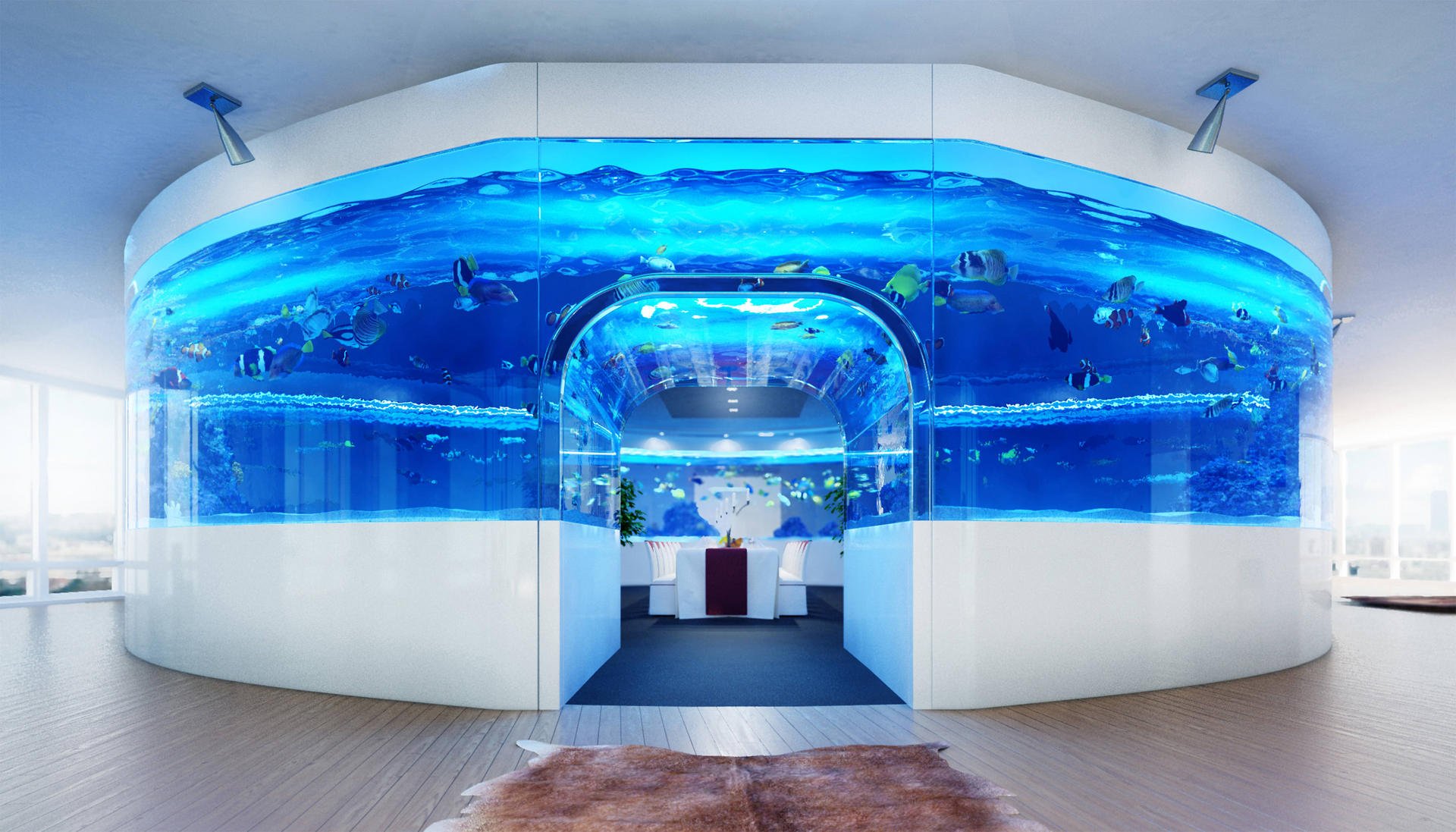 The aquarium is designed with a room inside so the owner can feel like they are surrounded by the ocean. There is enough floor space inside for dinner parties and dancing.