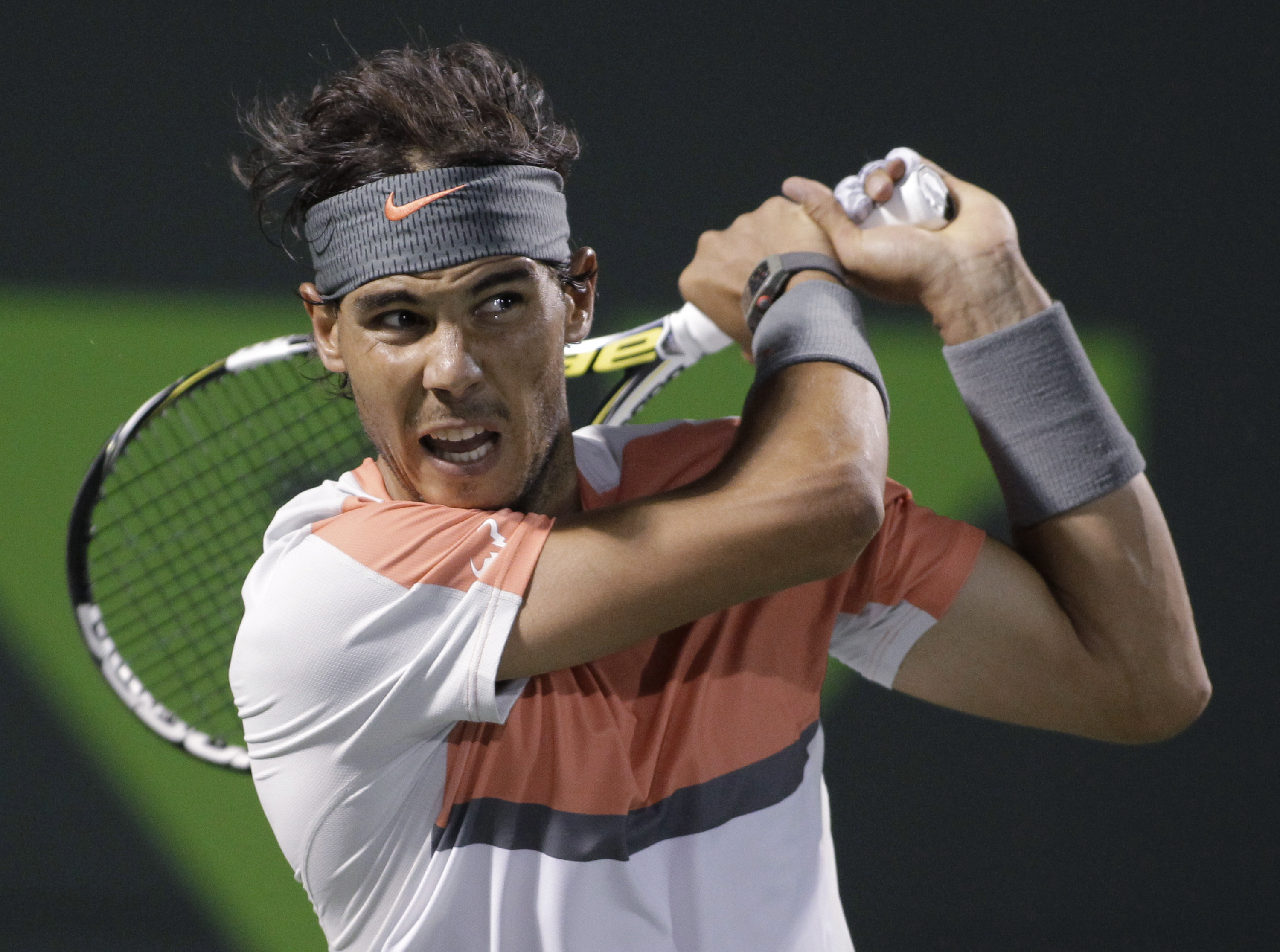Rafael Nadal follows through on a return to Fabio Fogniniduring the Sony Open in Key Biscayne, Florida. Nadal won 6-2, 6-2. Photo: AP