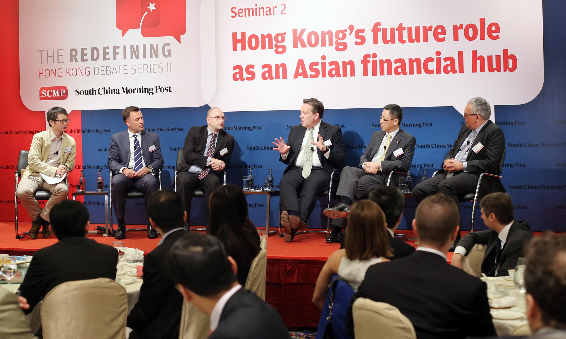 Post columnist George Chen (left) with the panel at yesterday's seminar discussing Hong Kong's role as a financial hub. Photo: K.Y. Cheng