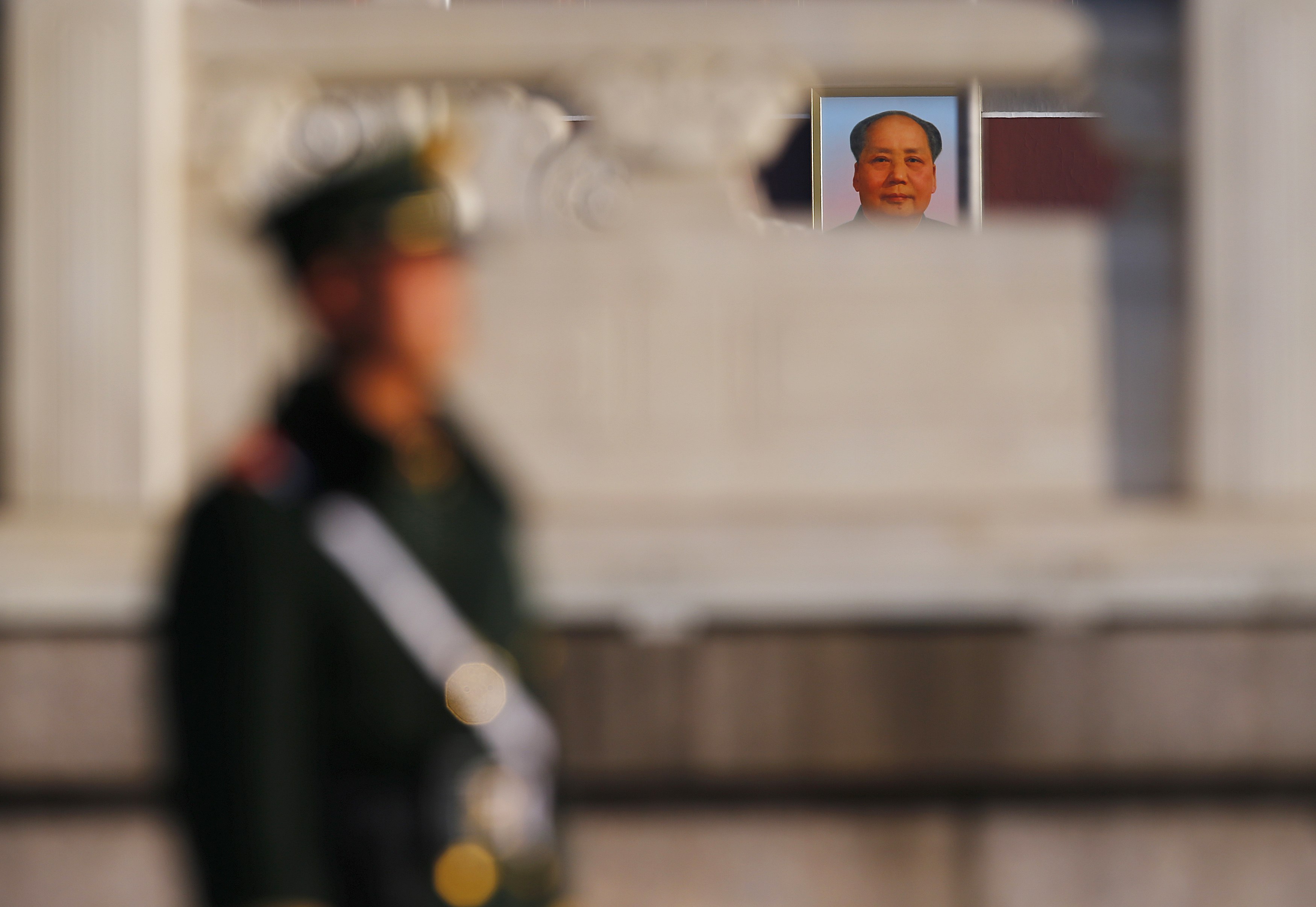 A paramilitary policeman stands guard in Tiananmen Square. Photo: Reuters