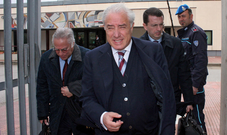 File image from March 2013 showing former Italilan Senator Marcello Dell'Utri (centre) leaving the Palermo Court of Appeals in Sicily. Photo: EPA
